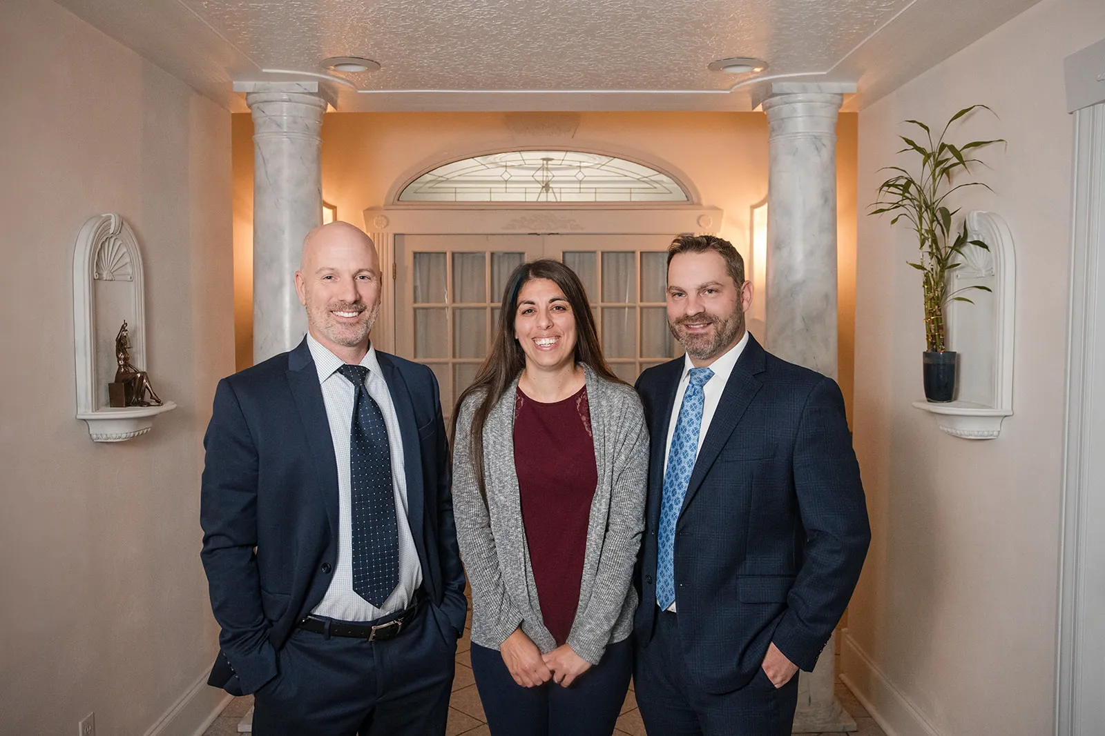 Jake Polverini, Melissa Taylor, and Justin Wiater at the firm's office
