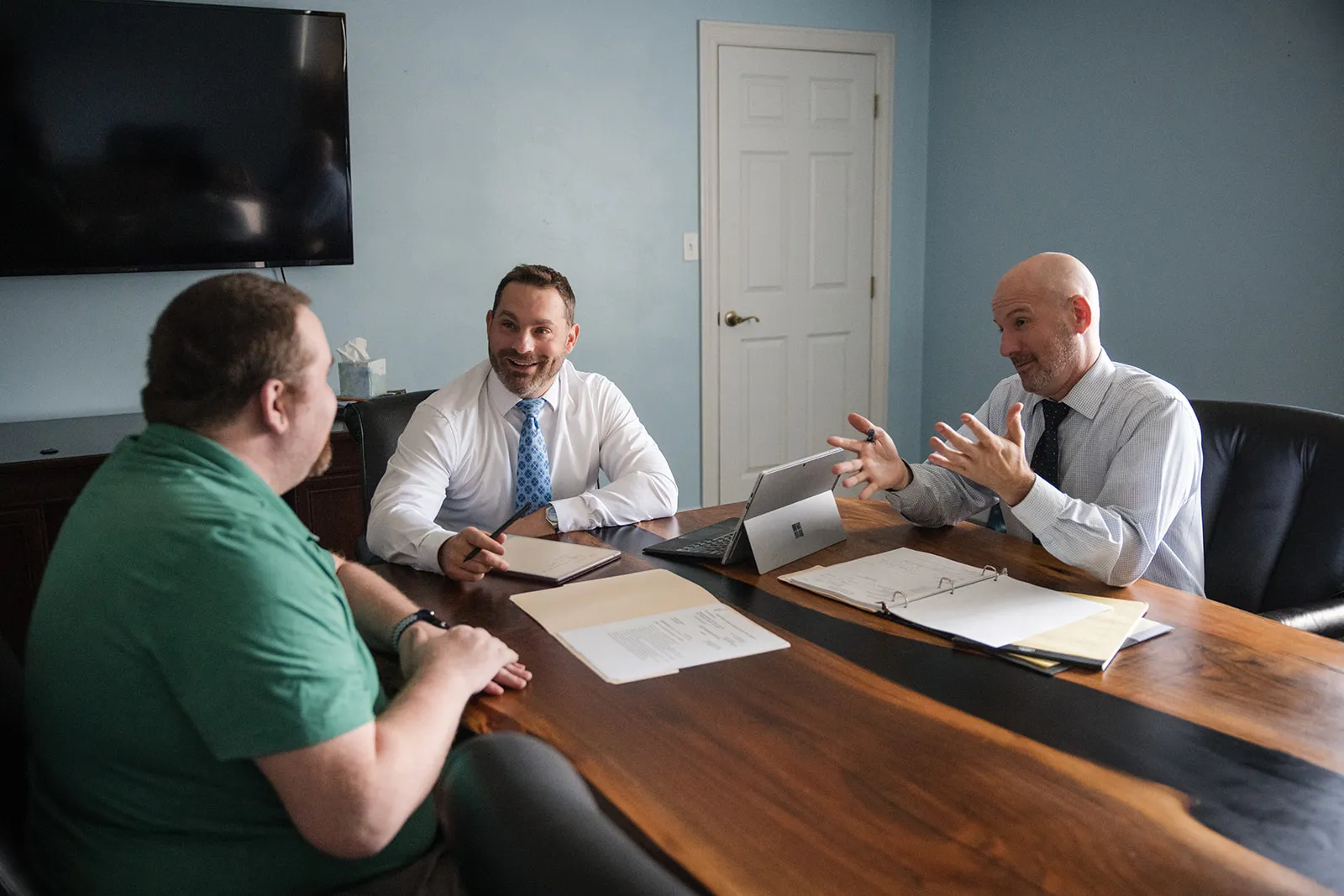 The Polverini & Wiater attorneys meeting with a client