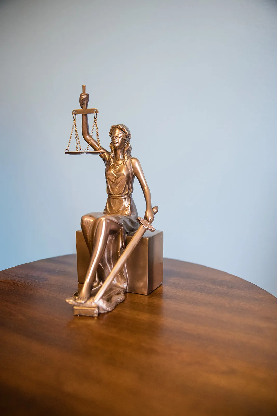 Lady Justice statue in the firm's office